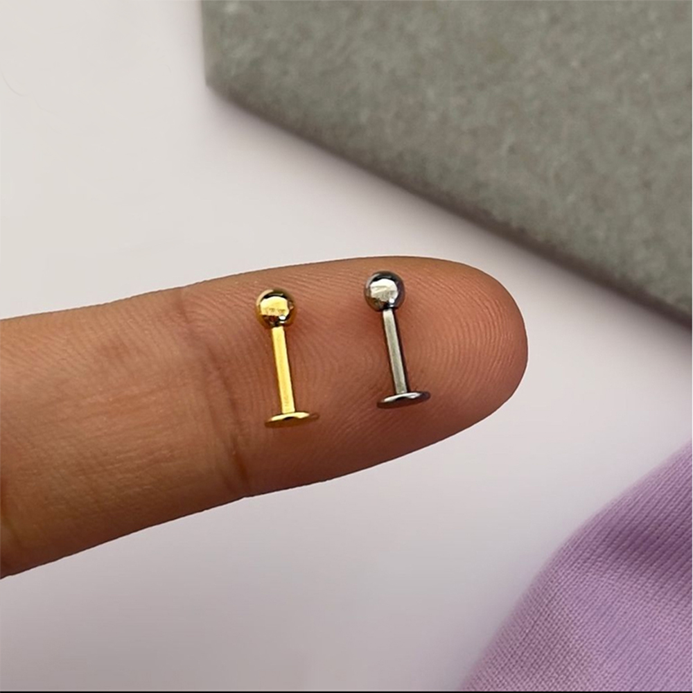 10 قطع من مجوهرات الجسم المصنو - مراجعة Belly Bar Titanium وسعره