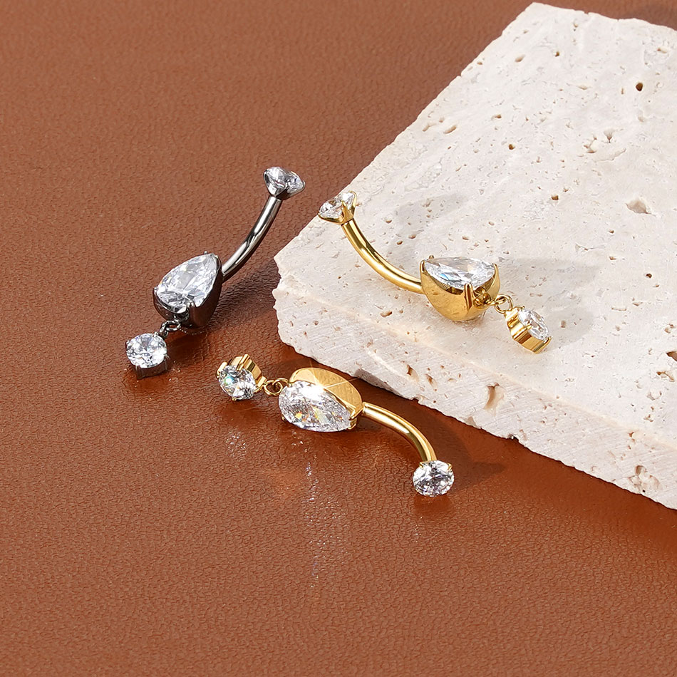 1/5 قطعة التيتانيوم كريستال ال - مراجعة Belly Bar Titanium وسعره